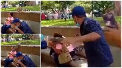 Iguana intentando robar comida a señora en parque de Michoacán