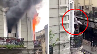 Se avienta desde el balcón: mujer se cuelga de cable para escapar de edificio en llamas en Argentina