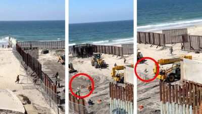 Con todo y perro: migrantes aprovechan obra para cruzar a EU desde playa de Tijuana