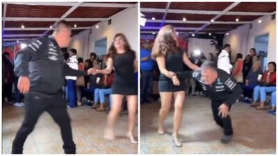 Hombre bailando con mujer en una fiesta