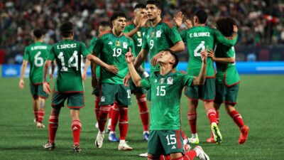 Jugadores de México celebran su triunfo en el partido amistoso ante Ghana