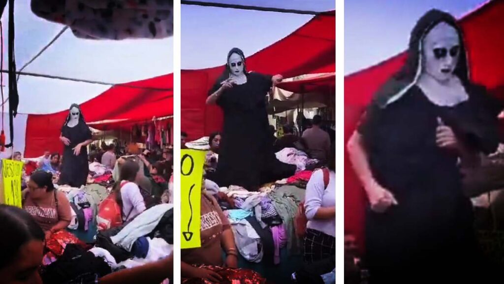 Monja baila en paca de ropa en el tianguis