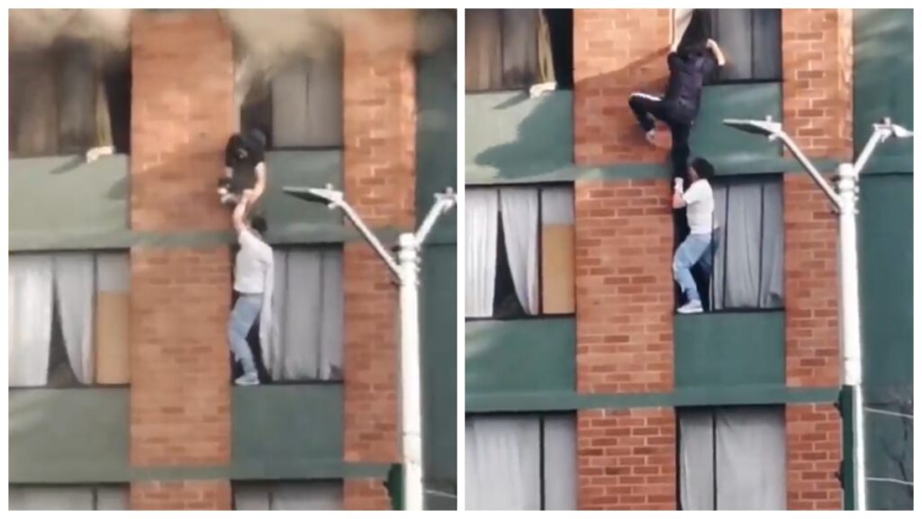 Arriesga su vida: hombre se trepa al siguiente piso para salvar a niña y perro de incendio en edificio de Colombia