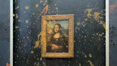 En el Museo del Louvre, La Mona Lisa está protegida por la lámina de policarbonato