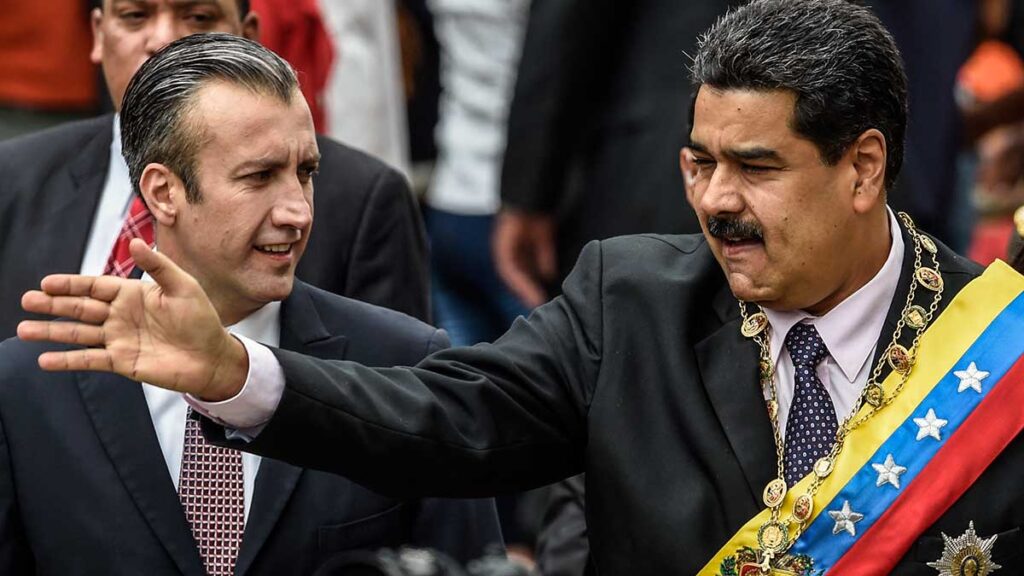 Tareck El Aissami con Maduro
