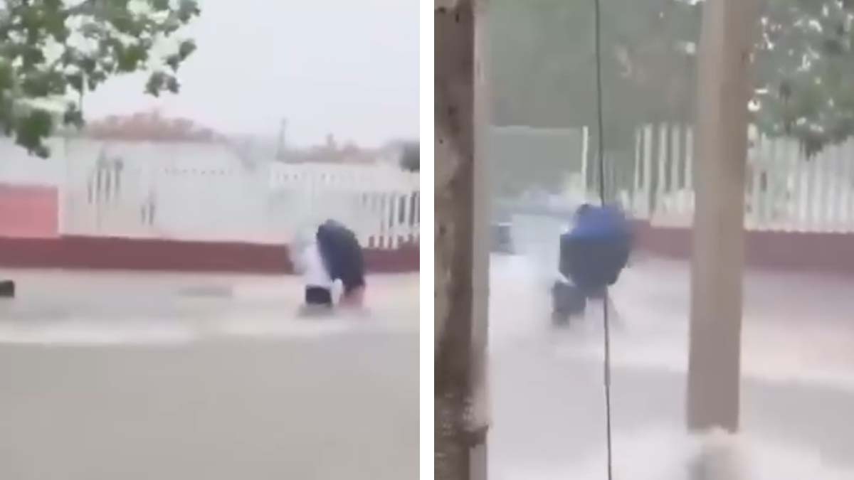 ¡Arriesgaron sus vidas! Padre e hijo casi son arrastrados por corriente de agua al cruzar avenida en Campeche